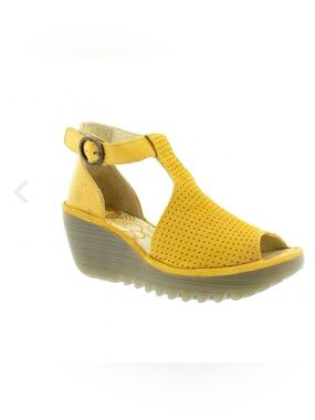Fly London Yall Cupido
Perforated Peep Toe Cut Out Wedge Heel 39/ 8.5 Yellow NWT